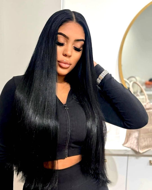 Luxe Collection Silky Straight - Mirabella Hair -  Woman with long jet black hair extensions - raw hair bundles